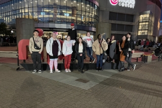 Young people at a Project 48 event in front of the Moda Center
