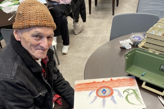 A person drawing a picture