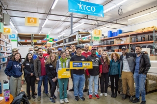 United Way of Columbia-Willamette and Immigrant and Refugee Community Organization volunteers in a warehouse
