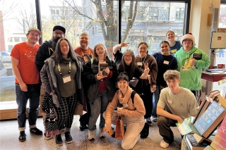 Group photo of people inside Powell's Books