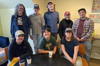 Group photo of volunteers for a garden cleanup