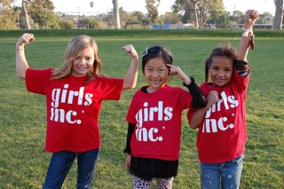 Three girls wearing Girls Inc. t-shirts