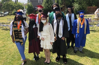High school graduates wearing masks