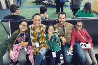 Photo of a family at the airport