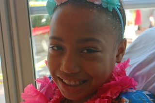 Photo of a girl wearing a lei