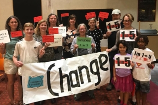 Photo of kids with a Change sign