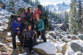 Photo of young people backpacking