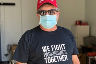 A man with We Fight Parkinson's Together t-shirt