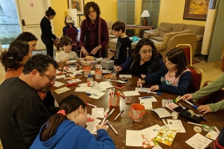 Photo of people gathered to write notes