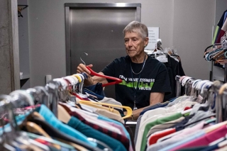Photo of a person organizing clothes