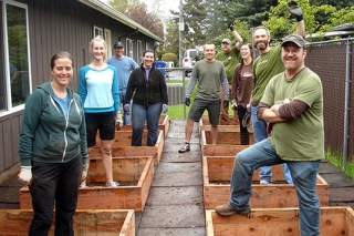 Photo of people working on planter boxes