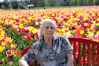 Photo of am older woman at a tulip farm