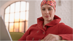 Thumbnail photo of a woman with a head scarf