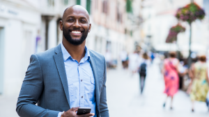 Social Media Toolkit: Comprehensive Coverage for Business Owners A businessman standing outside