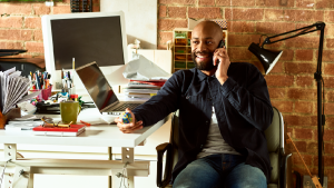 Social Media Toolkit: Comprehensive Coverage for Business Owners A man working at a desk