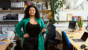 Social Media Toolkit: Share the Value of Business Protection A woman in her office