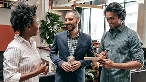 Colleagues talking in an office