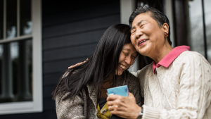 Social Media Toolkit: Start a Conversation About the Family Care Benefit A mother and daughter laughing together